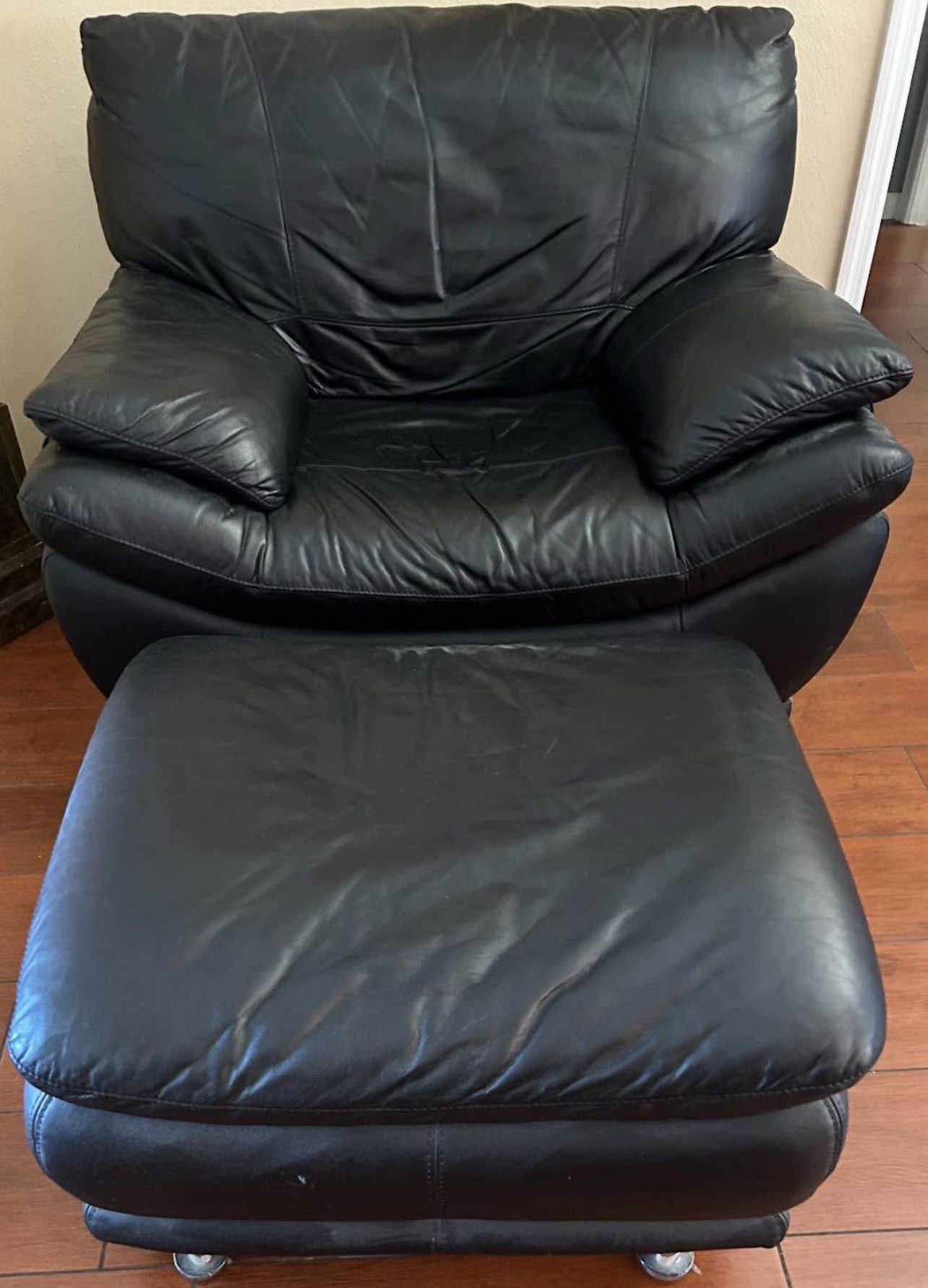 Oversized Black sofa chair with matching ottoman