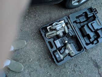 Portcable dril and saw w bat charger and case