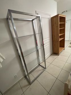 Metal shelf with glasses
