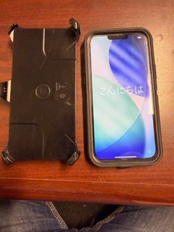 iPhone 14 Pro with Otter Box Holster