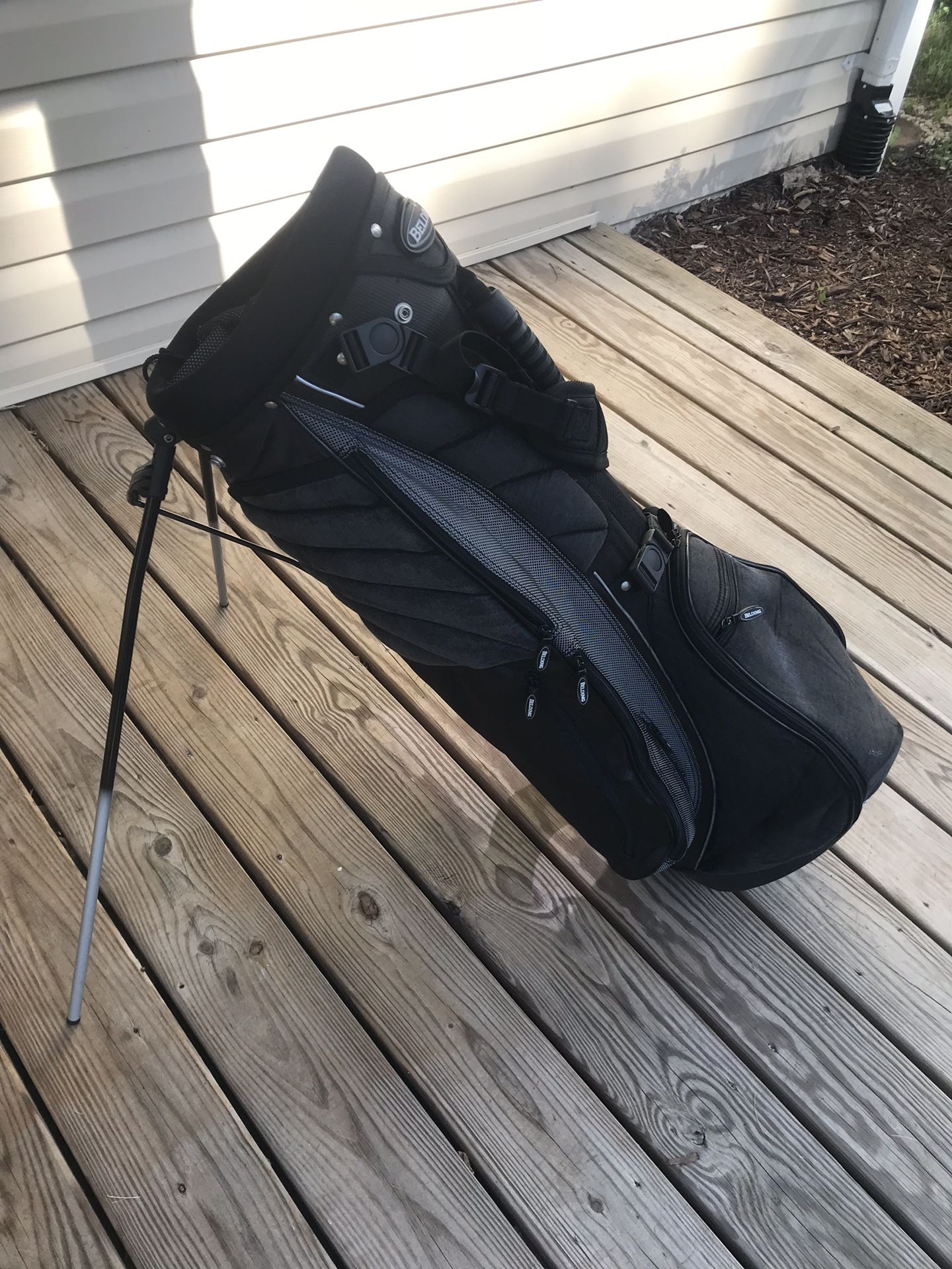 Golf bag with stand and strap