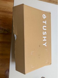 Bidet attachment for toilet seat