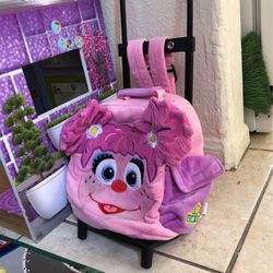 Sesame place Abby Character Backpack With Rollers