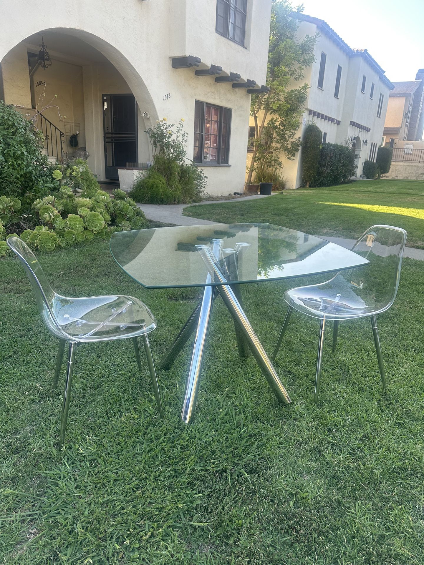 Glass Dining Table with Chrome Base And 2 Acrylic Chairs