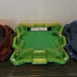 Beyblades And Stadiums