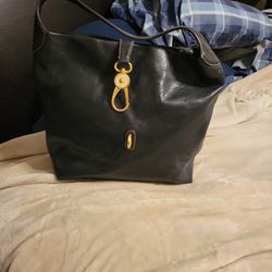 DOONEY BOURKE IN PERFECT CONDITION USED ONCE ALL LEATHER 
