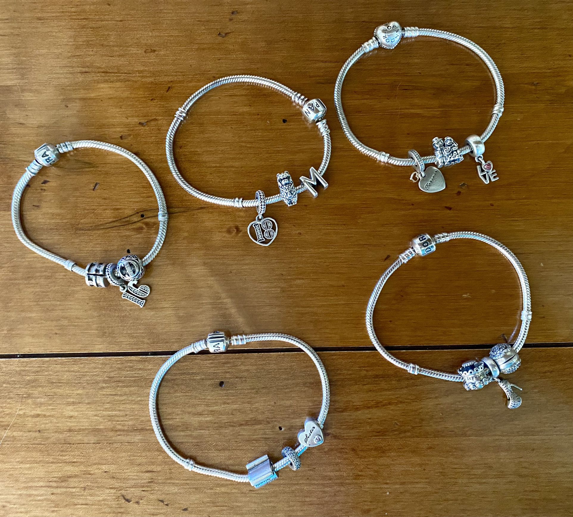 Pandora sterling silver bracelets and charms lot of 5