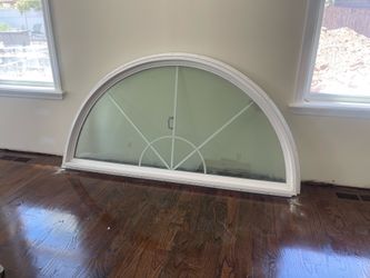 Half moon sunburst window