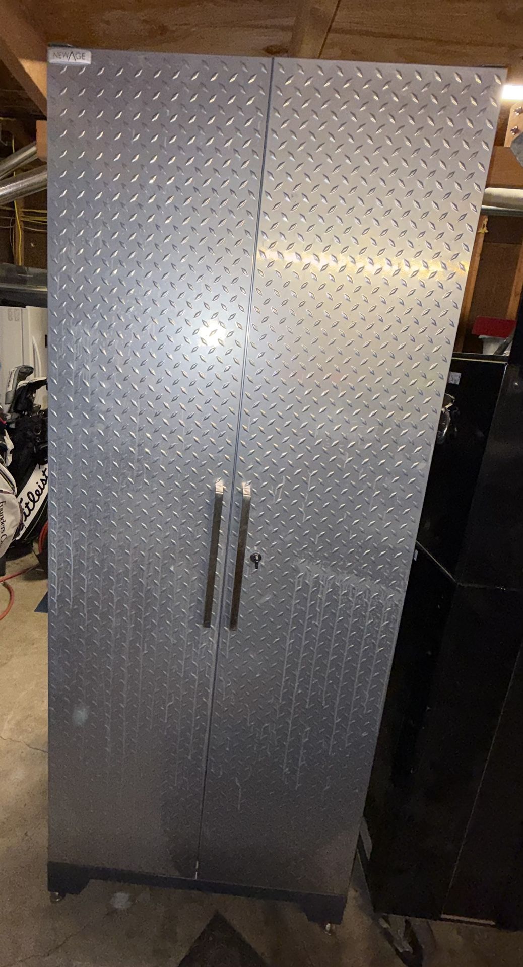 Garage Cabinets. 1 Tall 1 Small