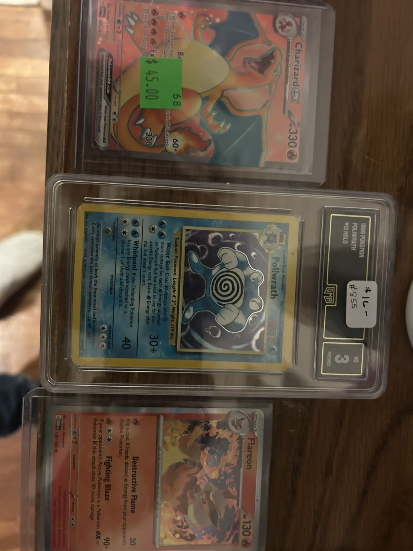 Graded Poliwrath Old School, Charizard Rare Holo
