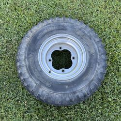 24x8x11 ATC 3 Wheeler Front Tire on OEM Honda Wheel. 