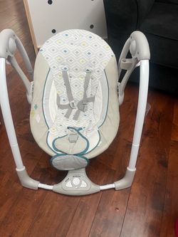 Musical baby swing