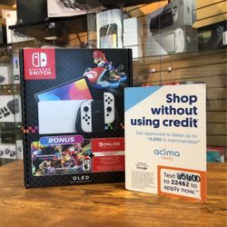 Nintendo Switch OLED w/Mario Kart & Deluxe