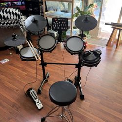 Beginner Electric Drum Set + Chair And Extra Sticks 
