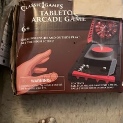 A table top arcade game