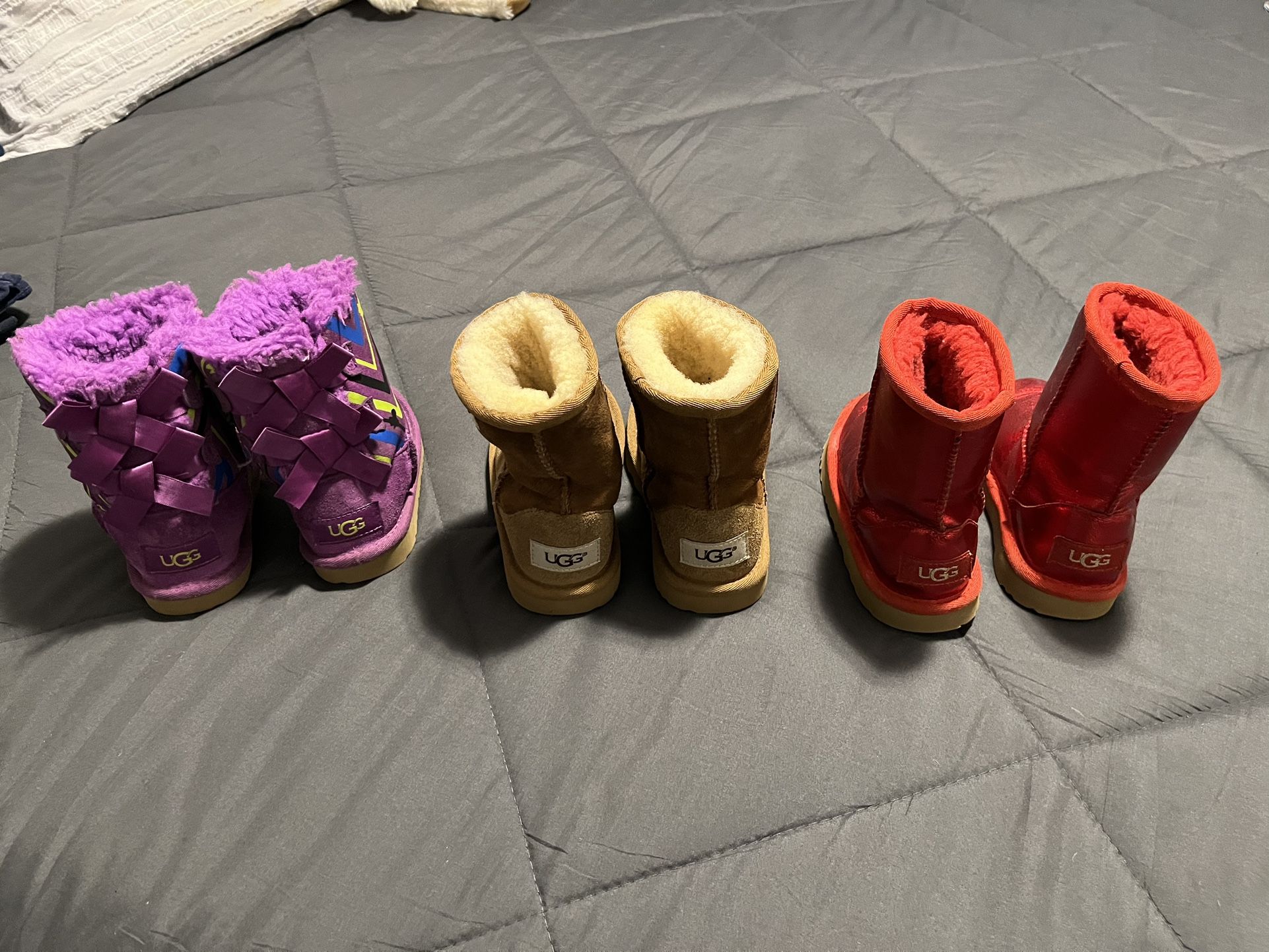 Girl Boots.. Colorful Purple UGGS size 8 Good Condition $45).Red Fair Condition Size 9 $40..)Tan size 10..Good Condition $55..(All 3 Pairs $120👇🏽