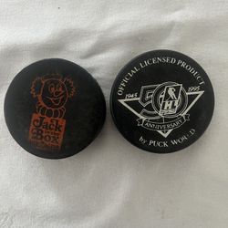 San Diego goals hockey pucks