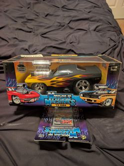 Muscle machines 1970 cuda black with flames