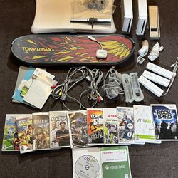 Nintendo Wii bundle, 12 games, 2 consoles, Tony Hawk skateboard, wii balance board, etc.