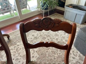 4 carved 1950’s Rose Medallion ding chairs