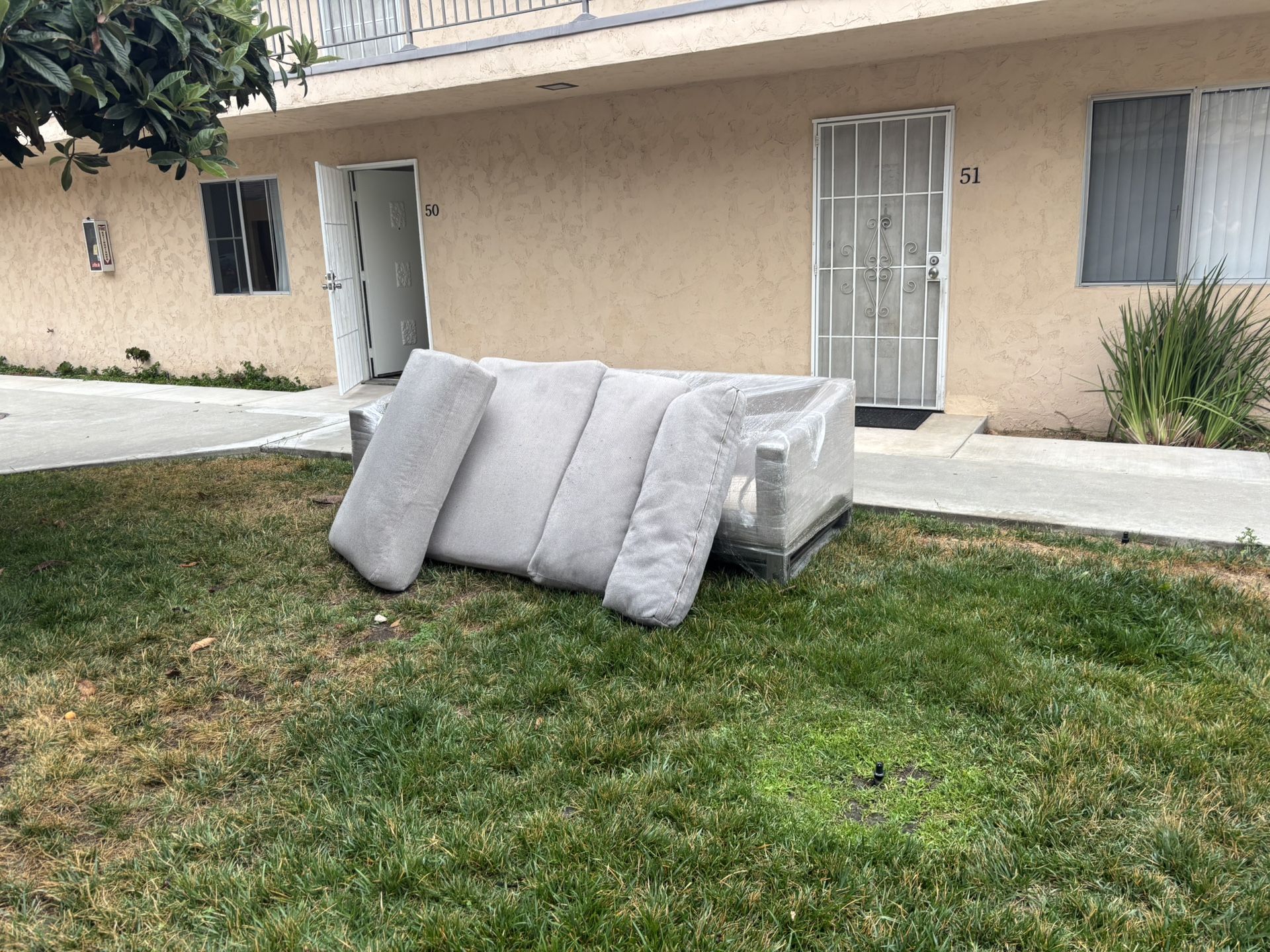 Grey Jerome’s Couch Free