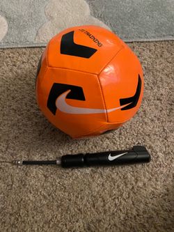 Nike soccer ball and pump