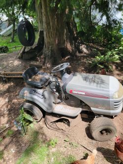 Two riding lawnmowers