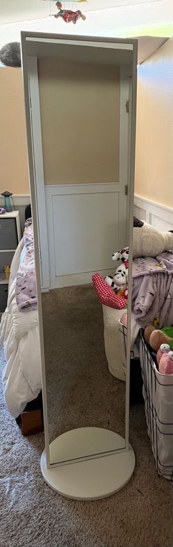 IKEA vennesla white floor length swivel mirror with hanging storage
