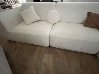 White sofa and pillows