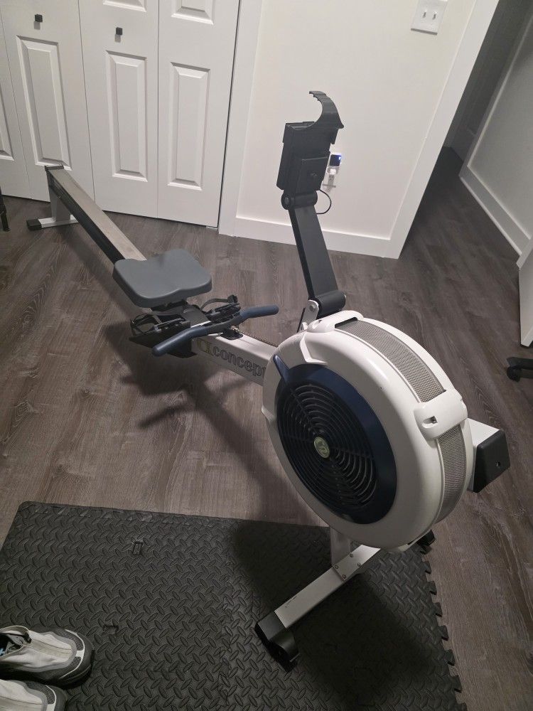 Concept2 RowErg Model D Indoor Rowing Machine with PM5 Monitor, Device Holder, Adjustable Air Resistance, Easy Storage (Gray)