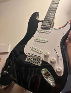 Black Stratocaster-Style Electric Guitar