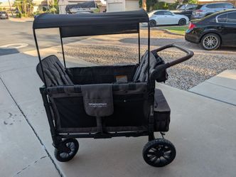 WonderFold W4 Luxe 4-Seater Stroller Wagon + Accessories — $475 OBO