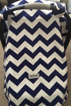 Car seat canopy. Color navy blue and white. Reversible. Almost new. Original prize $25