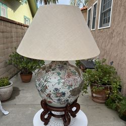 ANTIQUE ASIAN LAMP WITH WOODEN STAND AND LINEN SHADE