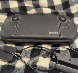 Steam Deck OLED 1TB handheld console, dock, tomtoc case