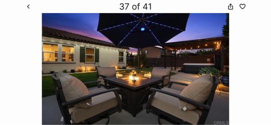 Outdoor furniture - fire pit with chairs, stools, dining table with chairs and umbrellas with solar lights