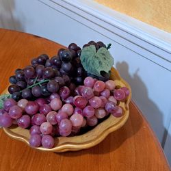 Decorative Bowl with grapes, 10 in wide 3 in tall.
