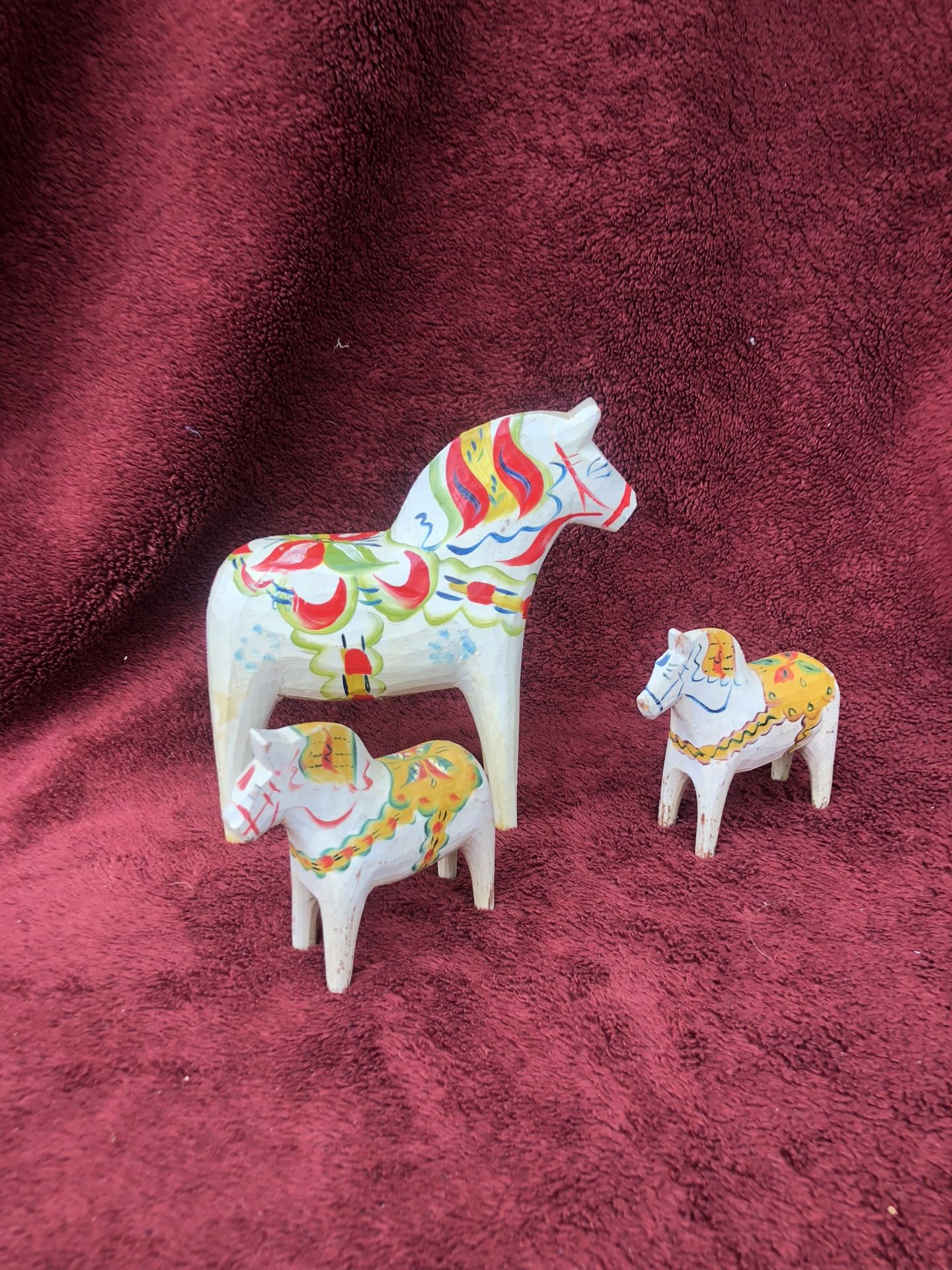 Hand carved/painted horse trio