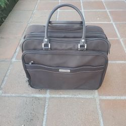 Rolling case " Reaction by Kenneth Cole"