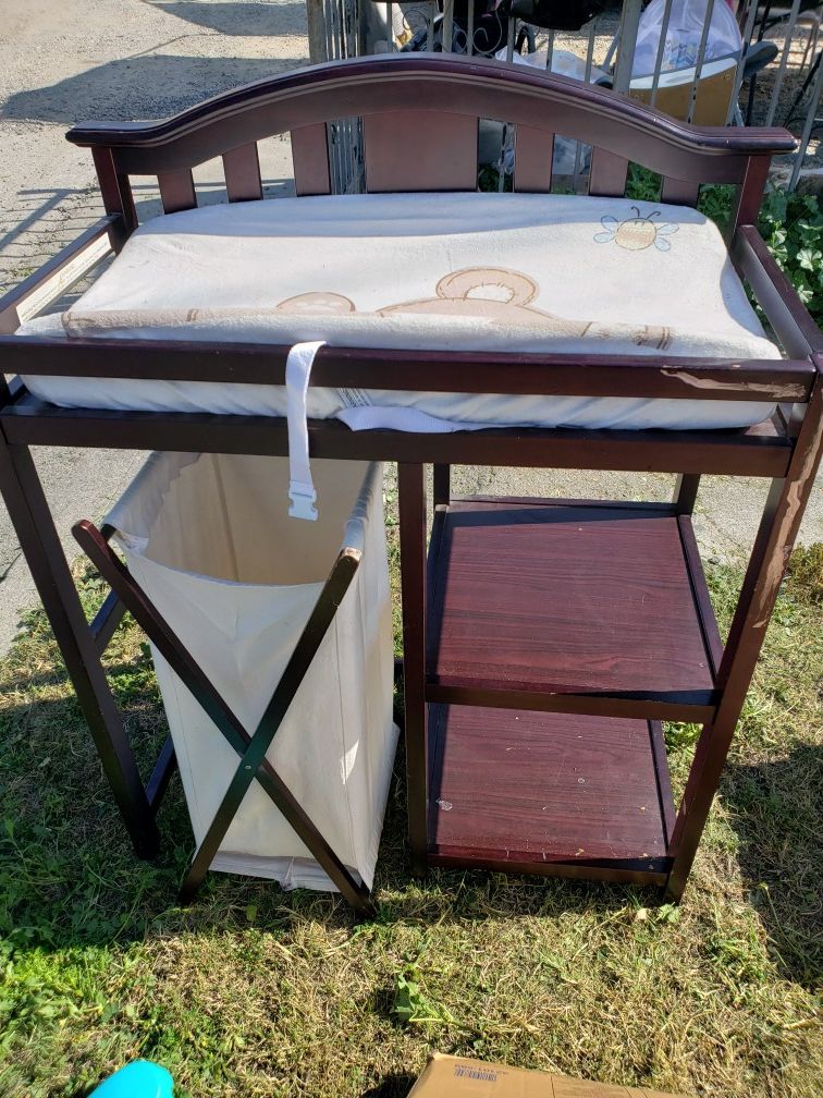 Cherry wood changing table and bottom basket