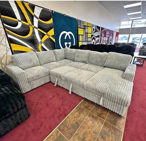 BRAND NEW IN BOX VELVET CORDUROY I SHAPE SECTIONAL WITN STORAGE SPACE. GREY BLACK AVAILABLE $1475!!!