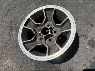 One original 14 inch aluminum 80-81 Camaro rim 5 on 4.75 lug