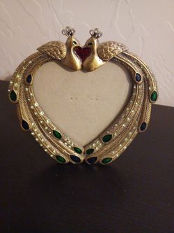 Peacock heart frame