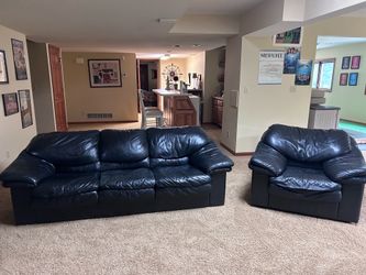 Natuzzi black leather couch and chair