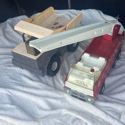Tonka fire truck and dump truck