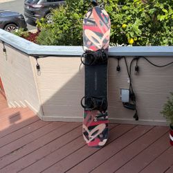Woman’s DC Snowboard With Bindings 
