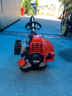 21.2 cc Gas 2-Stroke Straight Shaft String Trimmer with Rapid-Loader Trimmer Head and 16 in. Cutting Swath