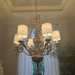 Six light chandelier wood finish accented in silver - 49 inches high and 53 inches wide