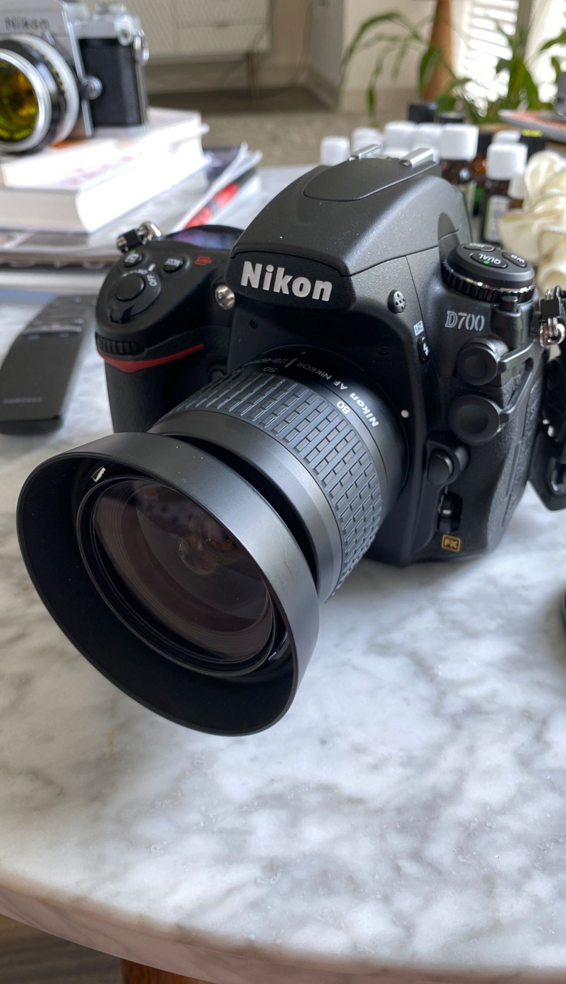 Nikon D700 plus 58 0.35/1.15 ft lense and digital holster 20