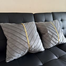Two Pillows With Modern Covers